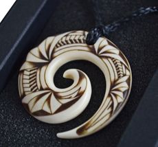 The bone carved pendant Akyhi and Ensei pass to the winner of their weekly sparing matches.